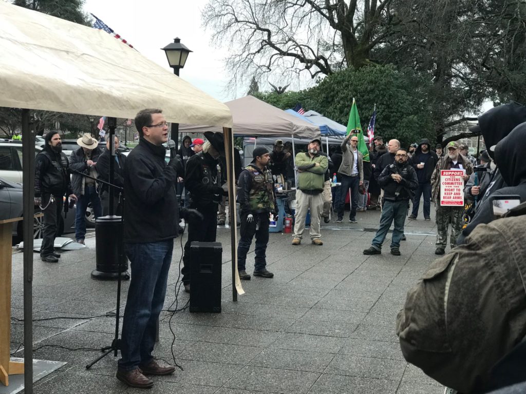 Washington state Rep. Representative Matt Shea, R-Spokane, speaks at the ''Rally 4 UR Rights'' gun rights rally in front of the state Capitol steps in 2018. CREDIT: ENRIQUE PEREZ DE LA ROSA / NORTHWEST NEWS NETWORK