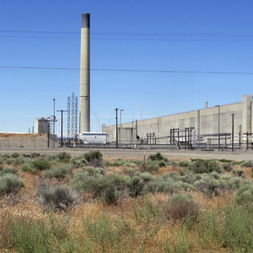 In this file photo taken June 13, 2017, the Plutonium Uranium Extraction Plant, right, stands adjacent to a dirt-covered rail tunnel, left, containing radioactive waste, amidst desert plants on the Hanford Nuclear Reservation near Richland, Wash. The U.S. Department of Energy said Tuesday, Nov. 14, 2017, that workers have finished stabilizing the partially-collapsed tunnel containing radioactive wastes left over from the production of plutonium for nuclear weapons. CREDIT: AP PHOTO/NICHOLAS K. GERANIOS