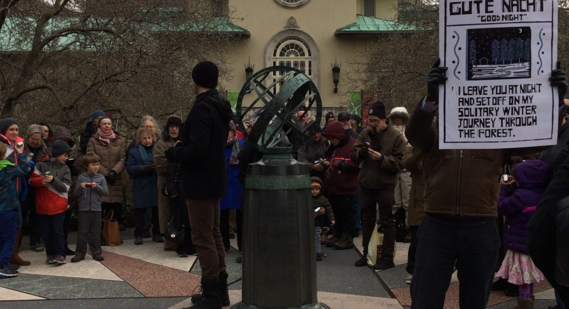 Christopher Herbert performs for a chilly crowd in the Brooklyn Botanic Garden in New York.