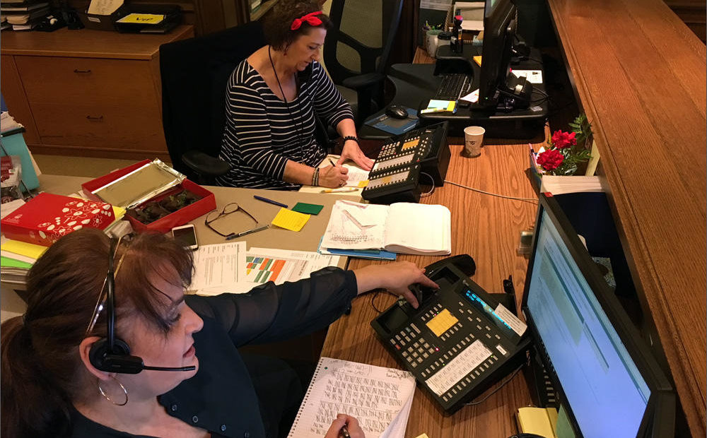 Front desk staff at Gov. Jay Inslee's office in Olympia tally calls urging the governor to veto SB 6617 exempting the Washington Legislature from the state's voter-approved Public Records Act. CREDIT: AUSTIN JENKINS