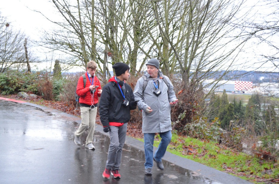 Two Cleveland High School students, Brandon Teeny and John Hoac, and Western Washington University Professor Troy Abel are measuring pollution on the Cleveland campus in south Seattle. CREDIT: EILIS O'NEILL