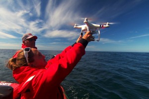 Dr. Leigh Torres releases a drone to study audio pollution in the area. CREDIT: EARTHFIX