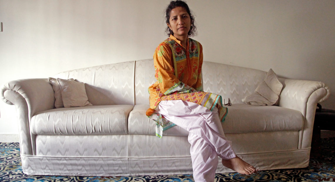 Leena Khandwalla, 44, at her family home in Karachi, Pakistan. After members of her religious community in the U.S. and Australia were arrested for performing female genital mutilation, she decided to go public about her childhood experience of undergoing FGM. CREDIT: DIA HADID/NPR