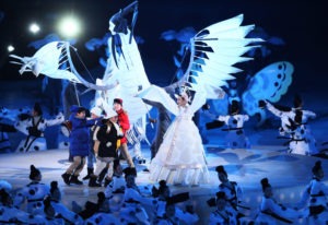 Dancers perform "The Land of Peace." The themes of the ceremony are harmony and convergence, and passion and peace. CREDIT: JAMIE SQUIRE/GETTY IMAGES