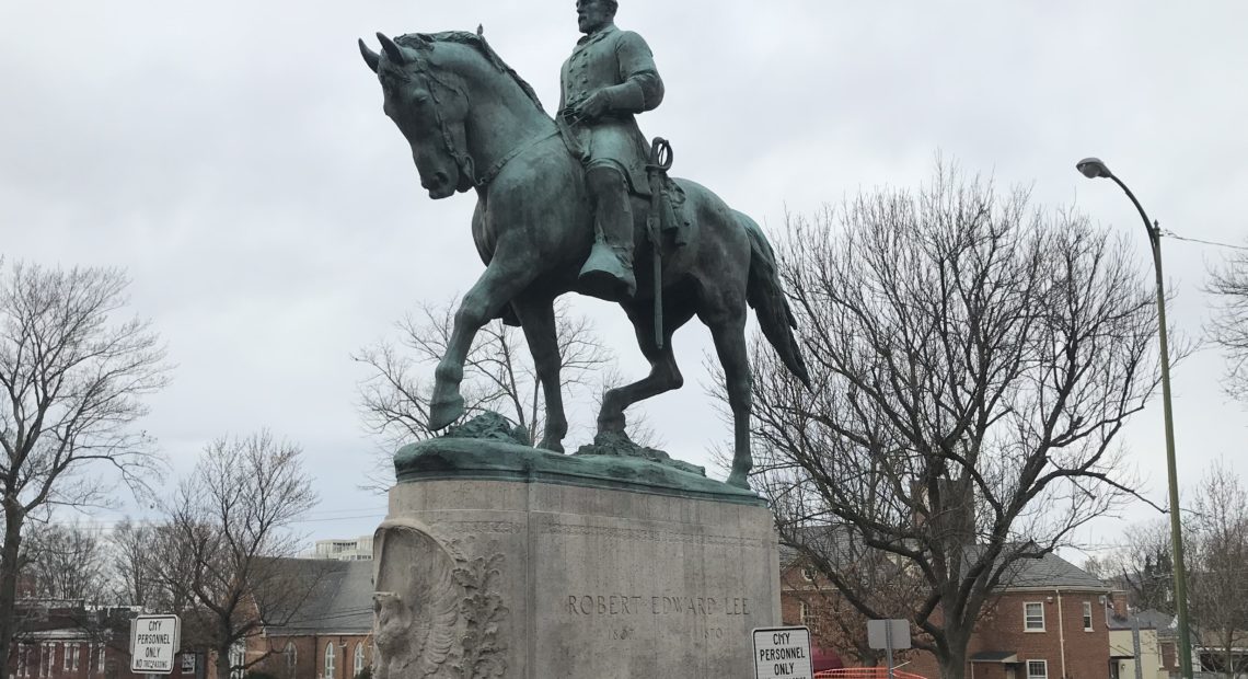 The shroud that had obscured the Robert E. Lee statue in Charlottesville, Va.'s, Emancipation Park since August was removed Wednesday morning. A judge ruled the shroud, as well as one over a Stonewall Jackson monument in a second park, was obstructing the right of the public to view the memorials. CREDIT: HAWES SPENCER