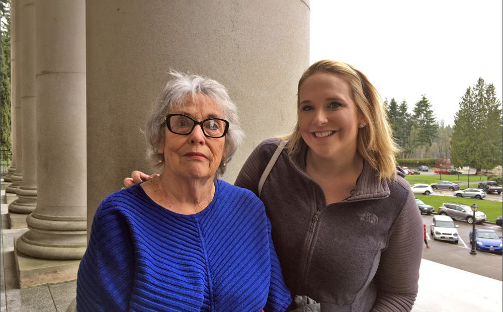 Betsy Deane and her granddaughter, Toria Staudinger, traveled to Olympia to witness Gov. Jay Inslee sign a grandparent visitation bill into law. Deane hopes to use the new law to win visitation rights to see her nine-year-old granddaughter. CREDIT: AUSTIN JENKINS / NORTHWEST NEWS NETWORK