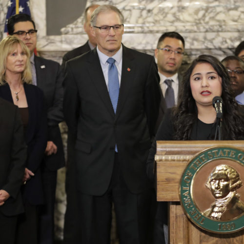 Dulce Gutierrez, right, Assistant Mayor of Yakima, speaks Jan. 5, 2018, during a news conference at the Capitol in Olympia about the need to address voter access in the state.