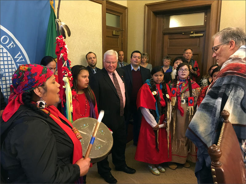After a bill signing ceremony in Olympia, women from several local tribes perform a song in honor of the missing and murdered indigenous women in the US, Canada and Alaska. CREDIT: AUSTIN JENKINS/N3