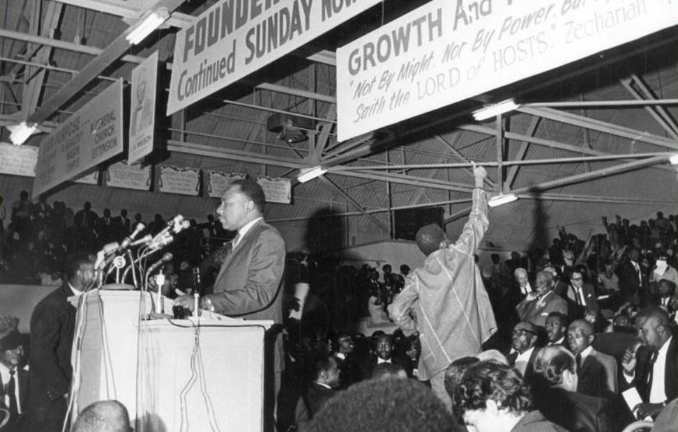 Martin Luther King, Jr. speaking to a mass meeting at the Mason Temple in support of striking sanitation workers. CREDIT: MEMPHIS-PRESS-SCIMITAR