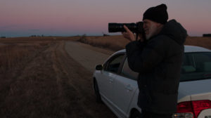 Neal Deunk photographs geese at a wildlife refuge north of Madison, Wis. CREDIT: NATE ROTT