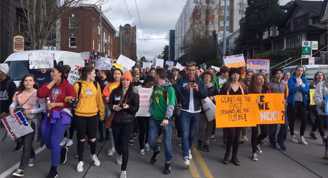 Students from some Seattle high schools march to a school safety rally at the University of Washington on March 14, 2018.