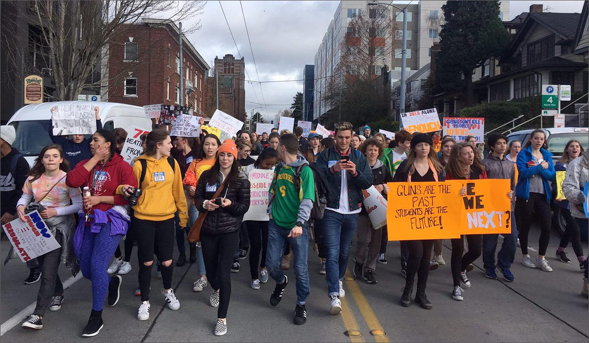 Students from some Seattle high schools march to a school safety rally at the University of Washington on March 14, 2018.