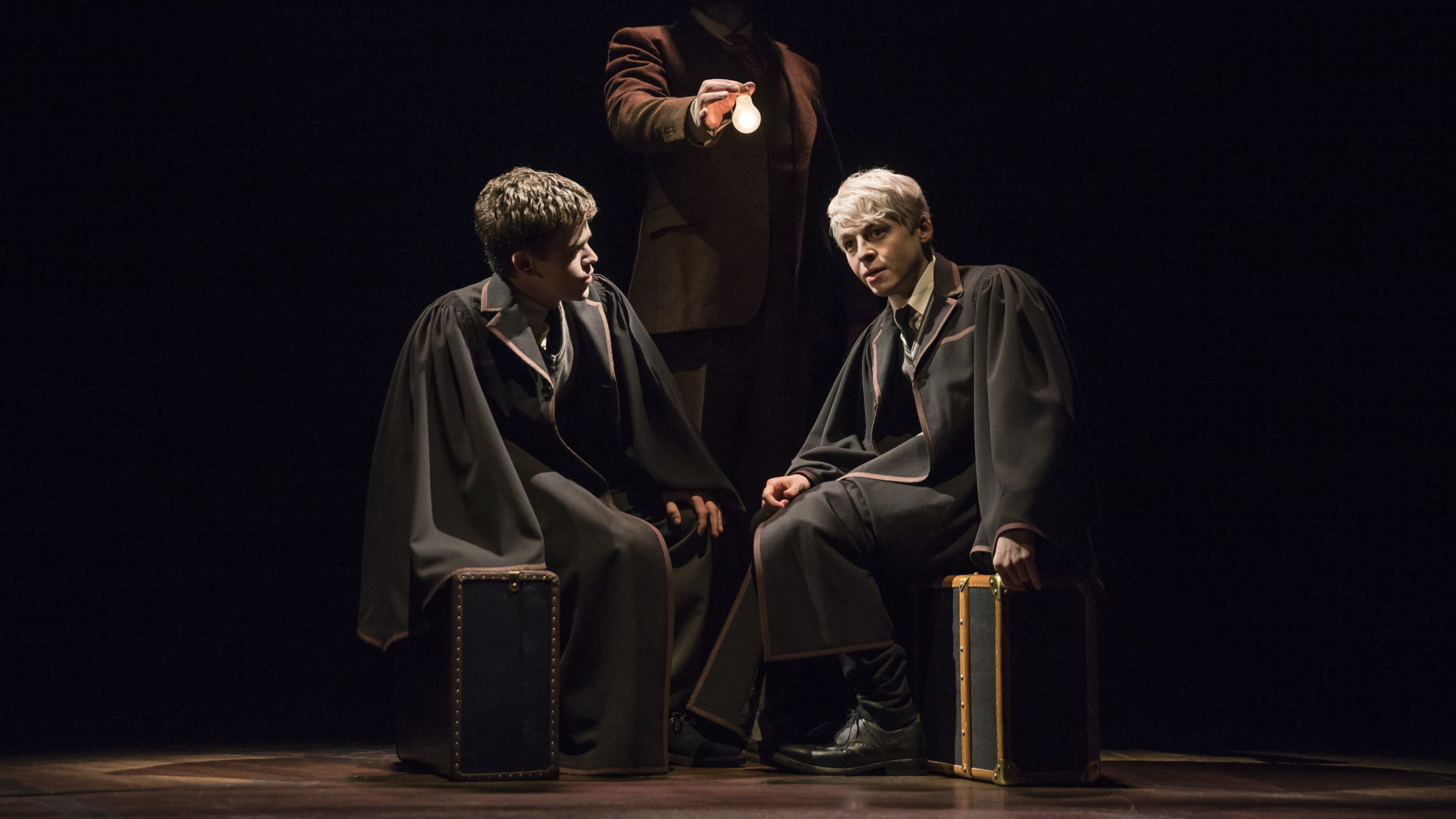 Harry's son, Albus (Sam Clemmett, left), befriends Scorpius Malfoy (Anthony Boyle) on the Hogwarts Express. CREDIT: MATTHEW MURPHY