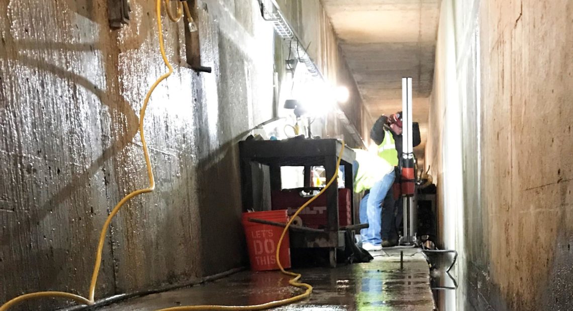 Workers drill core samples in the grout galleries of Priest Rapids Dam in southeast Washington to figure out how extensive leaking is in the structure’s spillway. CREDIT: GRANT PUBLIC UTILITY DISTRICT