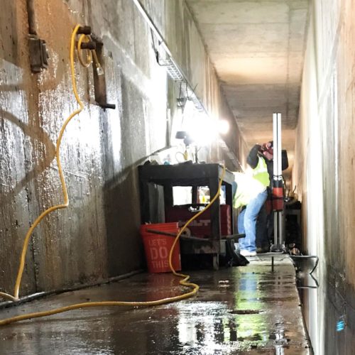 Workers drill core samples in the grout galleries of Priest Rapids Dam in southeast Washington to figure out how extensive leaking is in the structure’s spillway. CREDIT: GRANT PUBLIC UTILITY DISTRICT