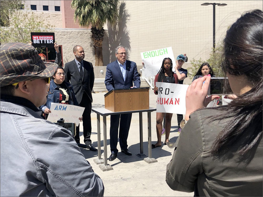 Washington Gov. Jay Inslee speaks at a news conference on gun violence at the University of Nevada Las Vegas. @JAYINSLEE/TINYURL.COM/YD6ESHE7