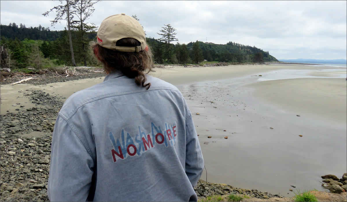David Cottrell models a shirt with a slogan that represents local hopes to retire the moniker Washaway Beach. CREDIT: TOM BANSE