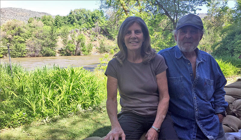 Rose and Andre Corso are trying to make the best of a potentially disastrous situation as they prepare for extreme flooding at their home alongside the Okanogan River in Tonasket, Washington.