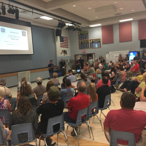 Roughly 200 people attended a public meeting at the high school in Oroville. They were briefed by emergency managers on flooding in the Okanogan Valley. CREDIT: EMILY SCHWING