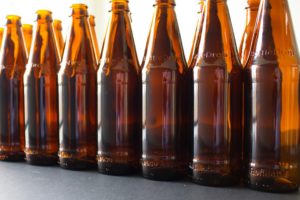 Seven Oregon breweries will be selling beer in reusable bottles with markings on the glass to indicate that they are refillable. CREDIT: OREGON BEVERAGE RECYCLING COOPERATIVE