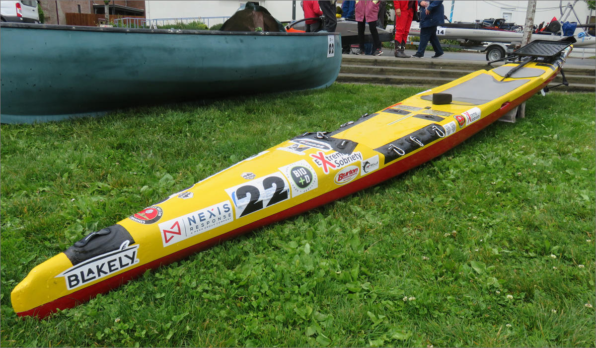 Prone paddleboarder Steve Rhoades of Bainbridge Island wants to stroke this 20-foot paddleboard using only his gloved hands all 750-miles of the Race to Alaska. CREDIT: TOM BANSE