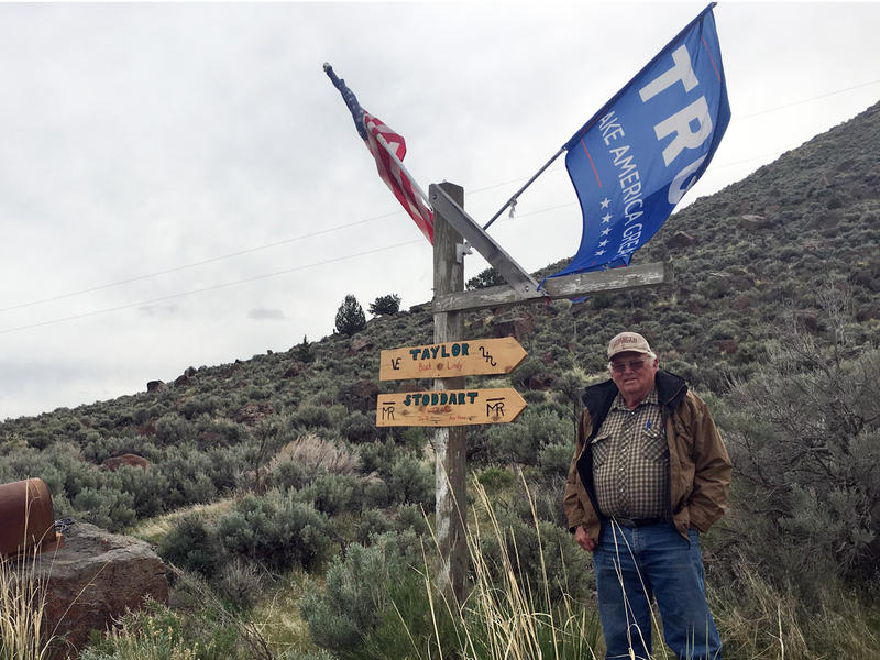 Rancher Buck Taylor proudly flies his American and Trump flags off his driveway mailboxes and signpost in Diamond Valley, Oregon. CREDIT: ANNA KING