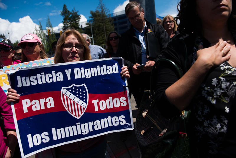 Mothers protest outside the SeaTac Federal Detention Center, where asylum seekers separated from their children were initially held. CREDIT: DANIEL BERMAN FOR KUOW