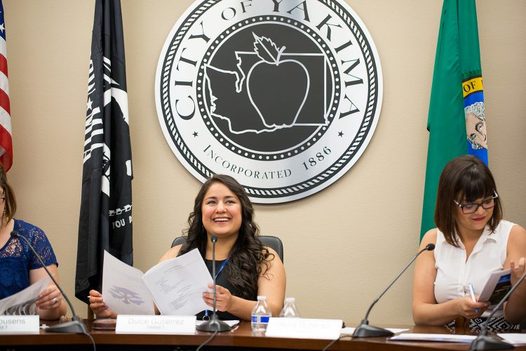 Yakima councilmember Dulce Gutierrez, center, is skeptical of the development to house farmworkers in the city due to the strain on affordable housing. CREDIT: ERIN LODI/UW COLUMNS MAGAZINE