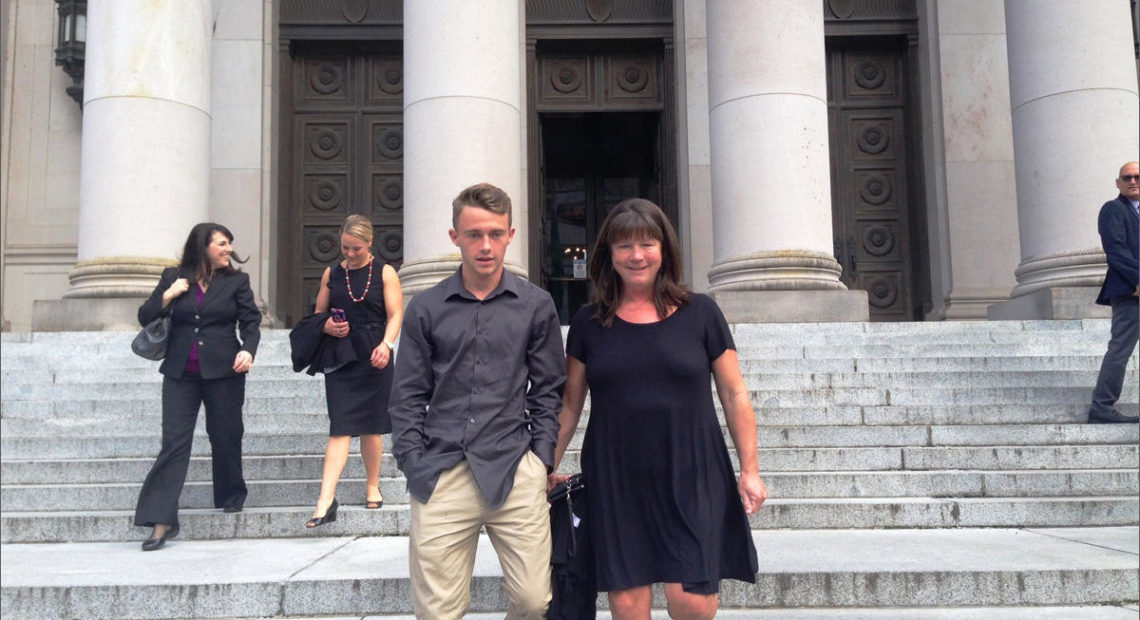 In this 2016 file photo, Stephanie McCleary and her son, Carter, leave the Washington Supreme Court following a hearing in the nearly decade-old school funding lawsuit that bears their name. CREDIT: AUSTIN JENKINS