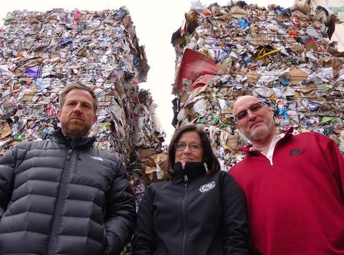Rogue Waste System’s Scott Fowler (left) and Laura Leebrick (center) have nowhere to send about 2,000 tons of baled and stacked of co-mingled recycling. CREDIT: JES BURNS