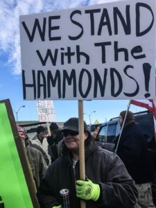 Protesters object to the sentencing of Oregon ranchers Dwight and Steven Hammond during a rally in Burns, Oregon, on June 2, 2016. CREDIT: AMELIA TEMPLETON