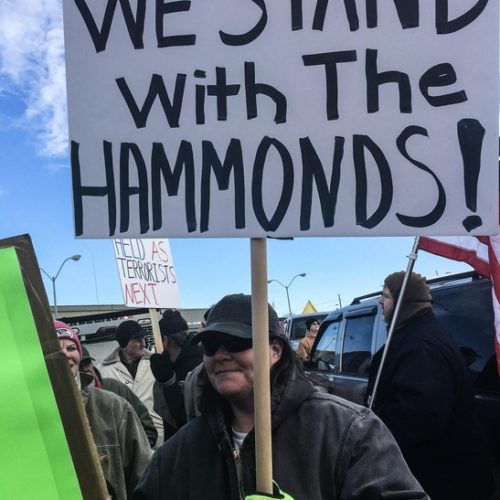 Protesters object to the sentencing of Oregon ranchers Dwight and Steven Hammond during a rally in Burns, Oregon, on June 2, 2016. CREDIT: AMELIA TEMPLETON