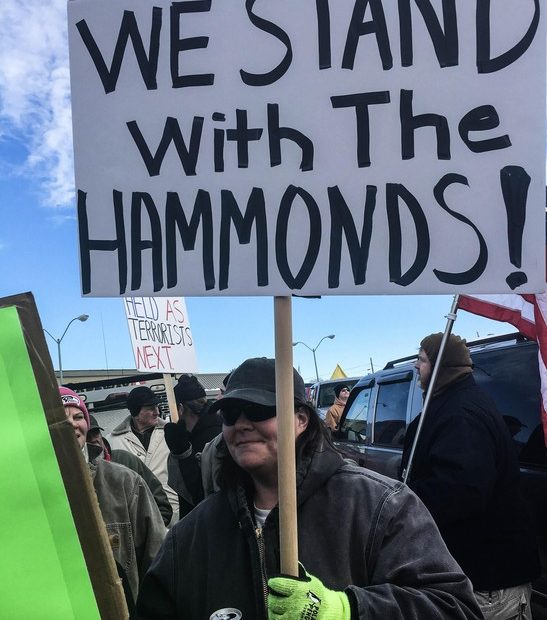 Protesters object to the sentencing of Oregon ranchers Dwight and Steven Hammond during a rally in Burns, Oregon, on June 2, 2016. CREDIT: AMELIA TEMPLETON