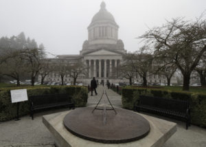 The Legislative Building and the sundial is shown on a foggy morning, Tuesday, March 6, 2018, at the Capitol in Olympia, Wash. The last day of the regular legislative session is Thursday, March 8, 2018. CREDIT: AP PHOTO/ TED S. WARREN