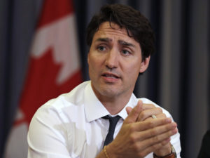Canadian Prime Minister Justin Trudeau, photographed in May, told reporters on Thursday, "I do not feel that I acted inappropriately in any way but I respect the fact that someone else might have experienced that differently," amid an allegation of groping 18 years ago. CREDIT: Charles Krupa/AP