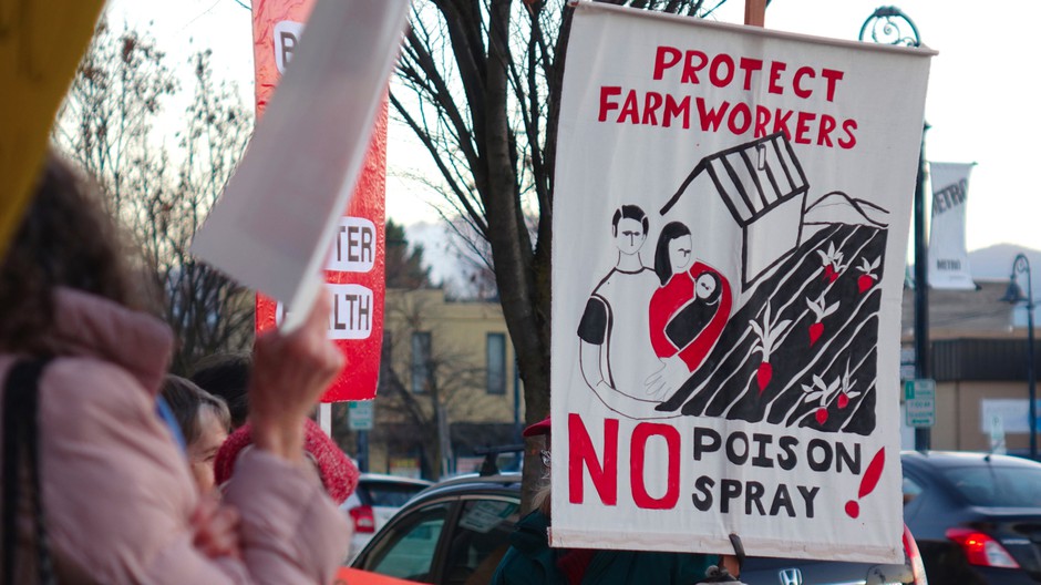 Advocates at a protest in Medford say new Oregon OSHA rules won't protect farmworkers. CREDIT: JES BURNS