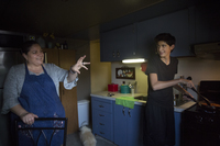 Angel and his mom, Aracely, cook dinner after school. Elissa Nadworny/NPR