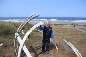 OSU Marine Mammal Institute Director Bruce Mate posed Thursday beside a sculptural installation mimicking whale bones in Newport's Don Davis Park. CREDIT: TOM BANSE