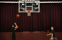 Angel plays basketball before starting the school day in Minto. Elissa Nadworny/NPR