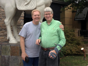 Paul Linnes, left, and his partner Michael Oakley, a patient at Brookhaven Hospital, at a Tulsa, Oklahoma, restaurant they often frequented for lunch. CREDIT COURTESY OF PAUL LINNES