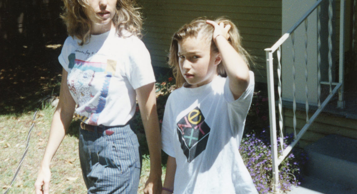 The author of Small Fry, Lisa Brennan-Jobs, walks with her mother, Chrisann Brennan, in Palo Alto, Calif. in the early 1990s. Courtesy of Lisa Brennan-Jobs