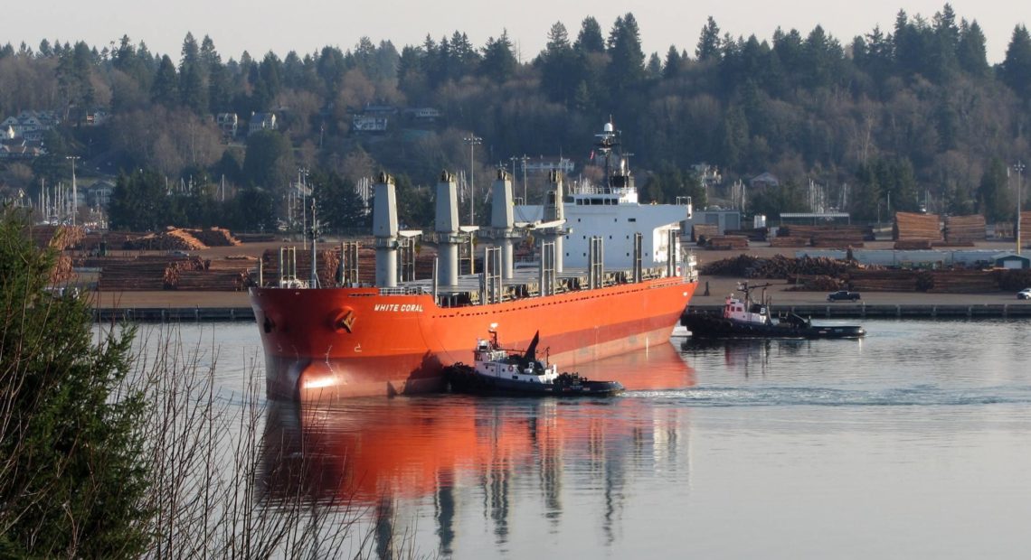 The Port of Olympia does a steady business exporting logs to China and Japan for Weyerhaeuser. Wood is now hit by a retaliatory tariff. CREDIT: TOM BANSE