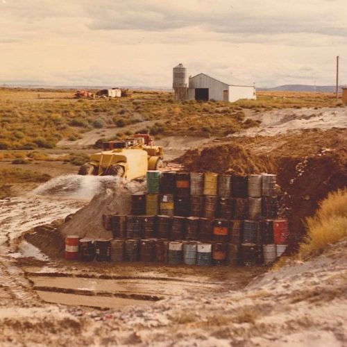 This photo from the 1970s shows various solvents and industrial chemicals that Washington state Ecology officials are trying to clean up in a Pasco Superfund site. CREDIT: WA DOE