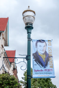 A banner for the first Adam West Day hangs in downtown Walla Walla.