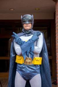 Actor Clint Young dressed as the 1960s Batman.