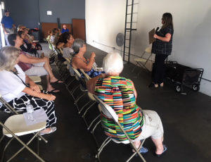 Kandice Hawes, director of Community Outreach for Bud and Bloom Cannabis store in Santa Ana, Calif., gives seniors an overview of medical marijuana. Stephanie O'Neill for NPR