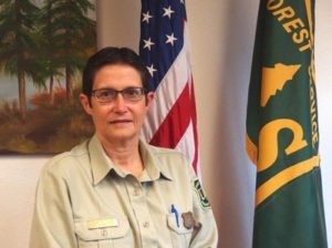 Denise Tolmie, a district ranger on the Sierra National Forest, says she believes that fire needs to be part of the forests she manages, but a fire has to fit in a 