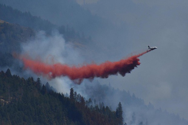 An air tanker makes a retardant drop on the South Umpqua Complex fires. CREDIT: U.S. FOREST SERVICE