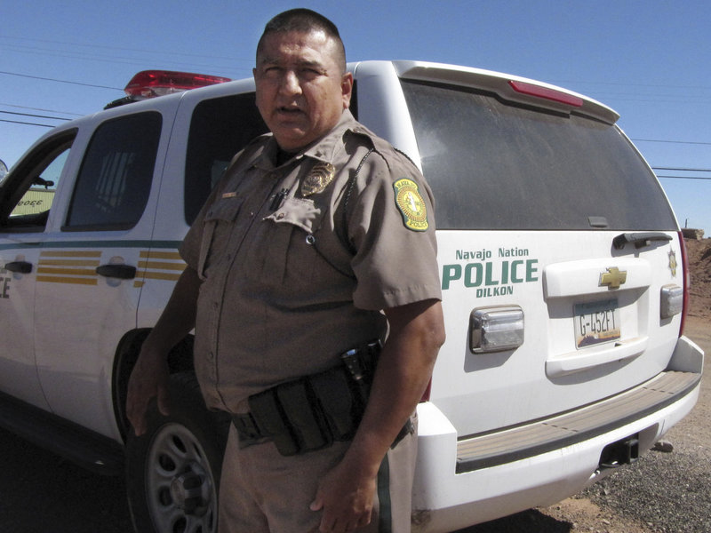 Navajo Nation police Lt. Clifton Smith's department is among those with access to national anti-crime databases. Attorney General Jeff Sessions is expanding that program. CREDIT: Felicia Fonseca/AP