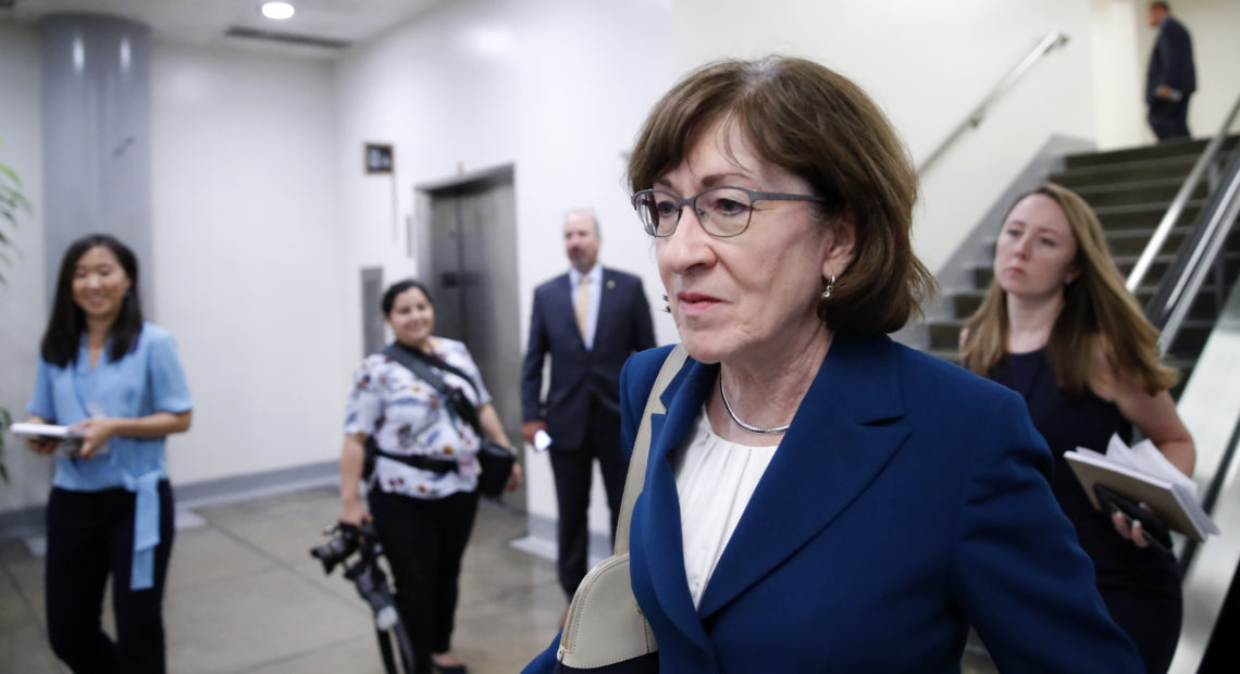 Sen. Susan Collins, R-Maine, walks on Capitol Hill on Wednesday. A key vote on Brett Kavanaugh's Supreme Court nomination, she said Thursday that the FBI investigation seemed "very thorough." CREDIT: Alex Brandon/AP